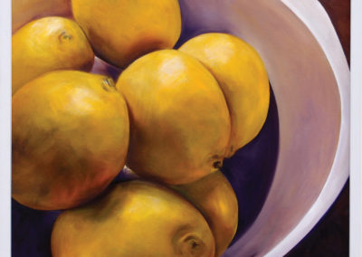 Lemons placed in an off white porcelain bowl with strong light and shadows. The view sees them from above, There is a strong contrast of dark and light using dark purple and yellows.